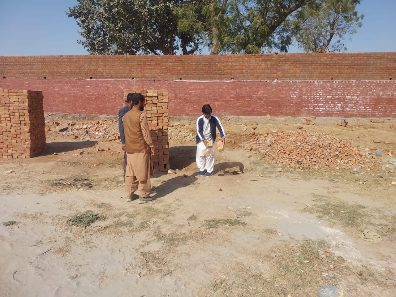 Visit of Construction of Boundary Wall Parking Shed - Okara